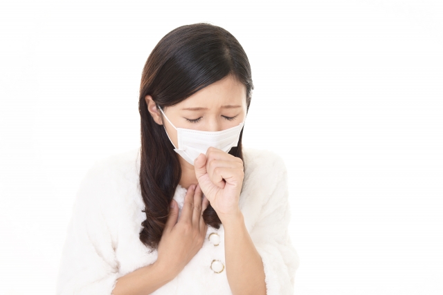 体調不良の女性