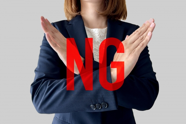 NGを示す女性